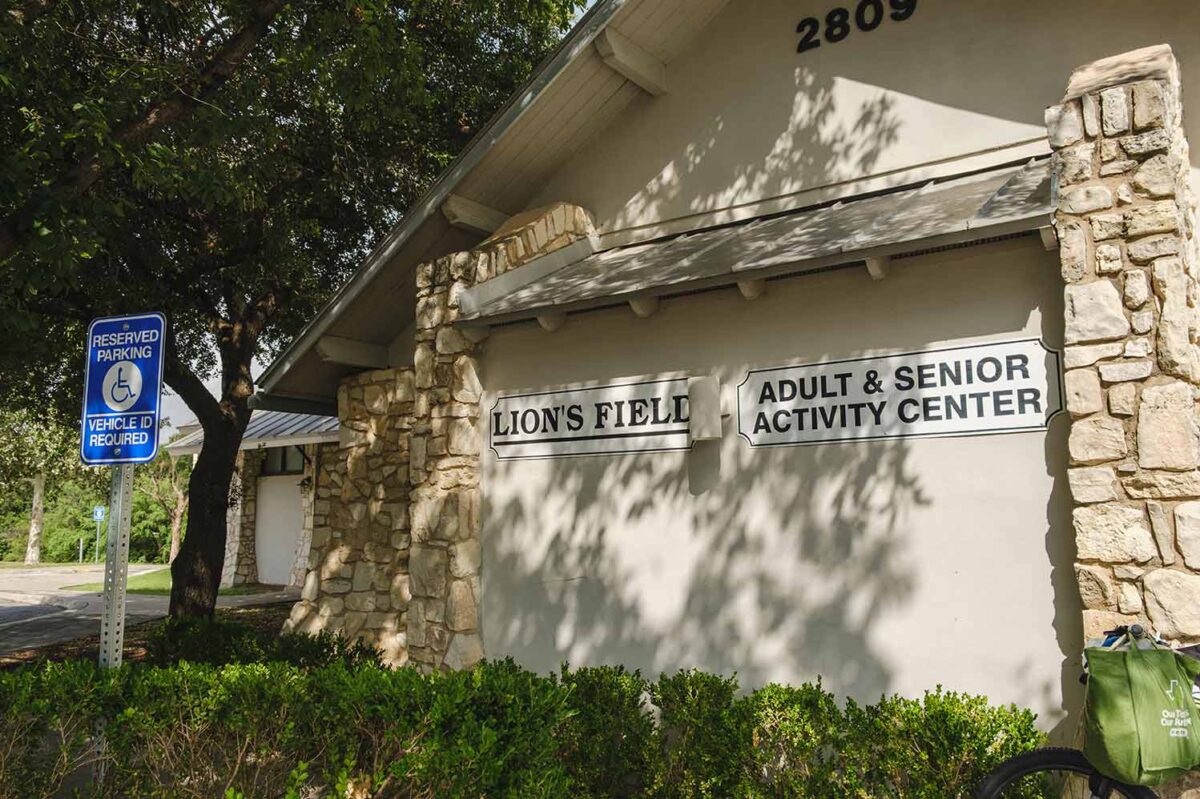 Photo of Lions Field building with sign and Senior Center sign pictured