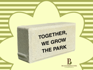 Brick that says together we grow the park