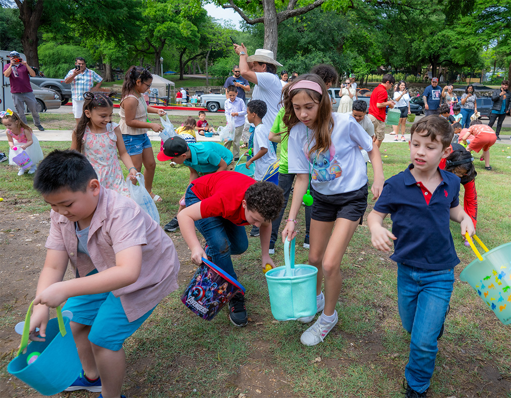 children egg hunting in the park